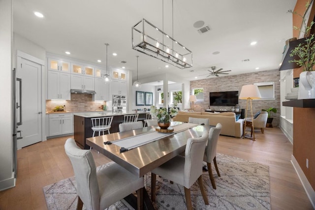 105 Monterey Oak Trl, Georgetown, TX 78628 - dining space featuring a ceiling fan, light wood finished floors, and recessed lighting