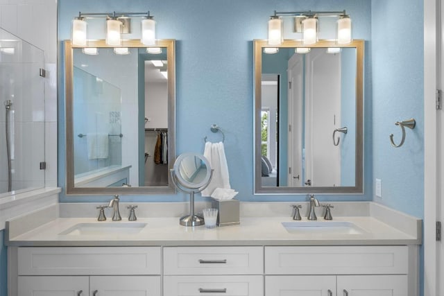 105 Monterey Oak Trl, Georgetown, TX 78628 - full bathroom featuring a stall shower and double vanity