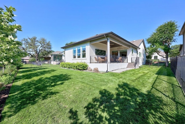 105 Monterey Oak Trl, Georgetown, TX 78628 - back of house with stucco siding and a patio area