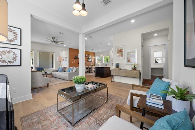 105 Monterey Oak Trl, Georgetown, TX 78628 - living area with recessed lighting, light wood-type flooring, a ceiling fan, and baseboards