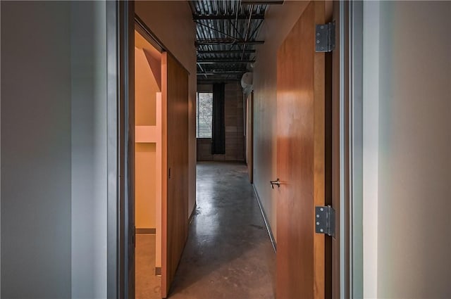 corridor with concrete floors