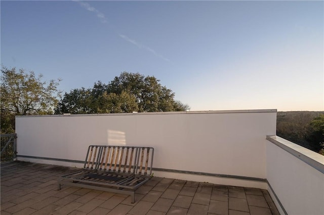 view of patio terrace at dusk