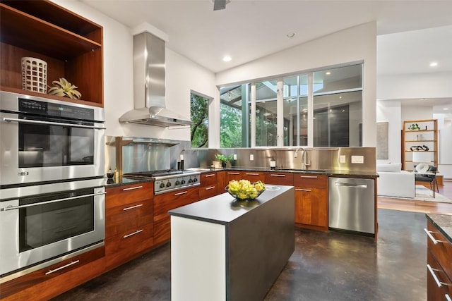5804 Kaelan Cv, Austin, TX 78730 - kitchen with modern cabinets, appliances with stainless steel finishes, wall chimney exhaust hood, finished concrete floors, and recessed lighting