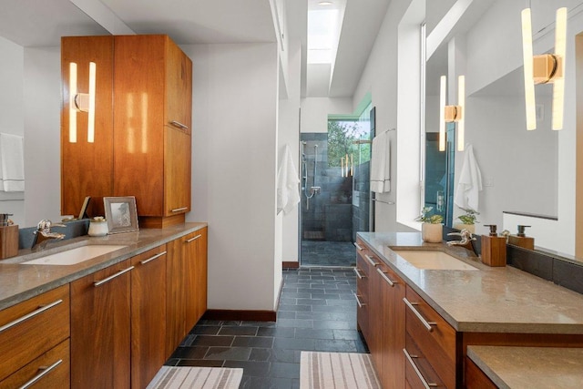 5804 Kaelan Cv, Austin, TX 78730 - bathroom with a shower stall, two vanities, and baseboards