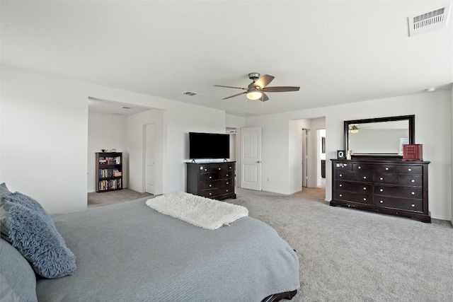 270 Johnny Cake Dr, Kyle, TX 78640 - carpeted bedroom with baseboards and a ceiling fan