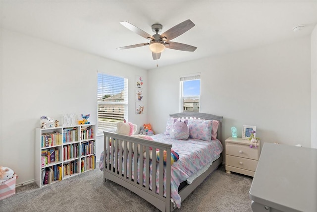 270 Johnny Cake Dr, Kyle, TX 78640 - bedroom featuring multiple windows, carpet flooring, and ceiling fan