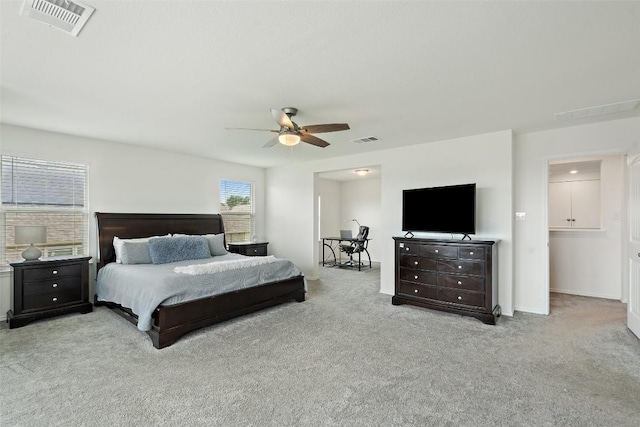 270 Johnny Cake Dr, Kyle, TX 78640 - bedroom with carpet flooring, a ceiling fan, and baseboards