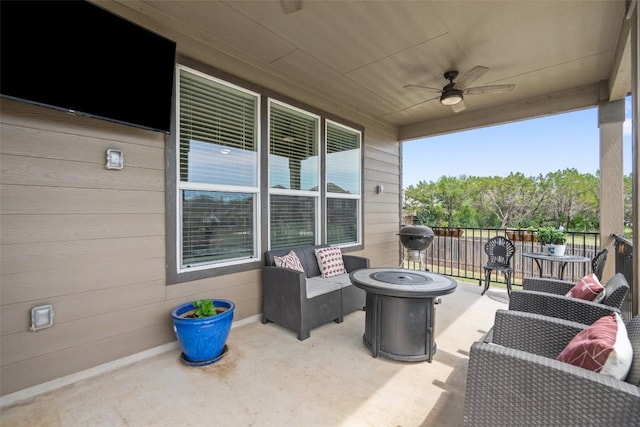 270 Johnny Cake Dr, Kyle, TX 78640 - view of patio / terrace featuring a ceiling fan and an outdoor living space with a fire pit