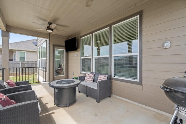 270 Johnny Cake Dr, Kyle, TX 78640 - view of patio with ceiling fan, an outdoor living space with a fire pit, fence, and a grill
