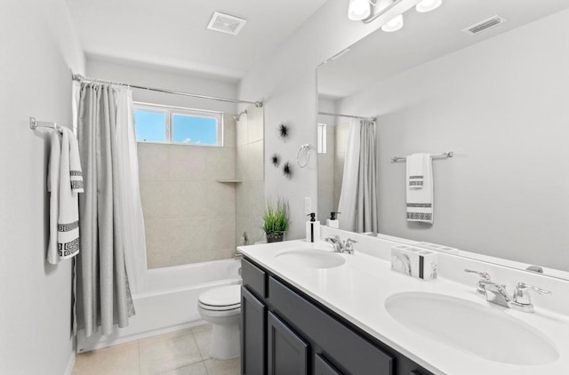 246 Salt Springs Rd, Kyle, TX 78640 - full bathroom featuring toilet, tile patterned floors, double vanity, and shower / bath combo