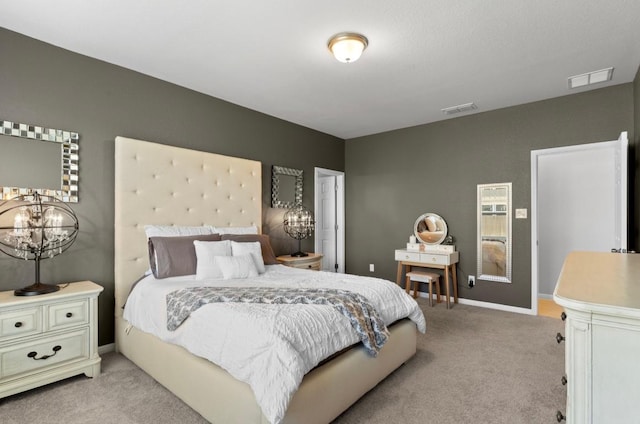 246 Salt Springs Rd, Kyle, TX 78640 - bedroom featuring light colored carpet, a chandelier, and baseboards