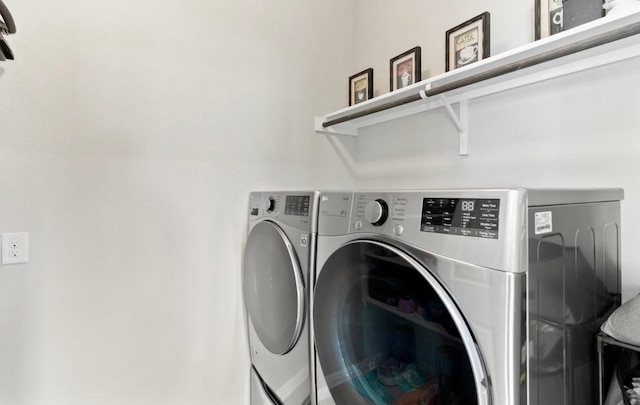 246 Salt Springs Rd, Kyle, TX 78640 - washroom featuring washer and dryer