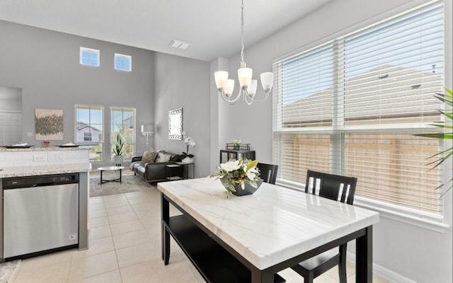 246 Salt Springs Rd, Kyle, TX 78640 - dining room featuring a chandelier and light tile patterned floors