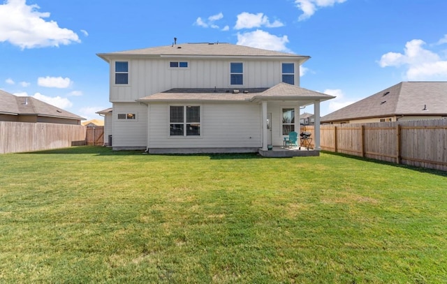 246 Salt Springs Rd, Kyle, TX 78640 - back of house with board and batten siding and a fenced backyard
