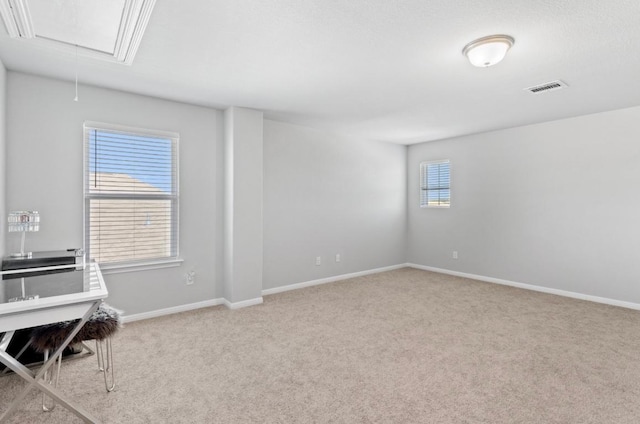 246 Salt Springs Rd, Kyle, TX 78640 - carpeted empty room with attic access and baseboards