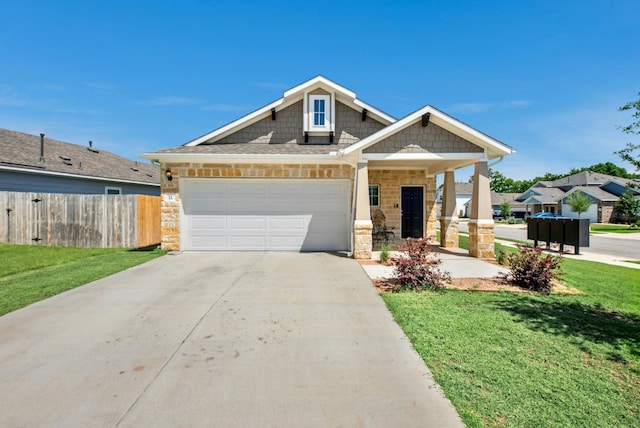 11 Bent Trail Ln, Georgetown, TX 78628 - view of front of property with stone siding, concrete driveway, and a garage
