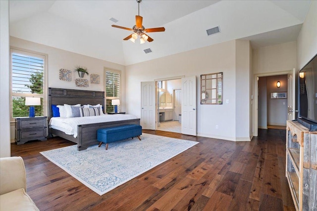209 Steamboat Xing, Dripping Springs, TX 78620 - bedroom featuring dark wood finished floors, ensuite bathroom, baseboards, high vaulted ceiling, and a ceiling fan