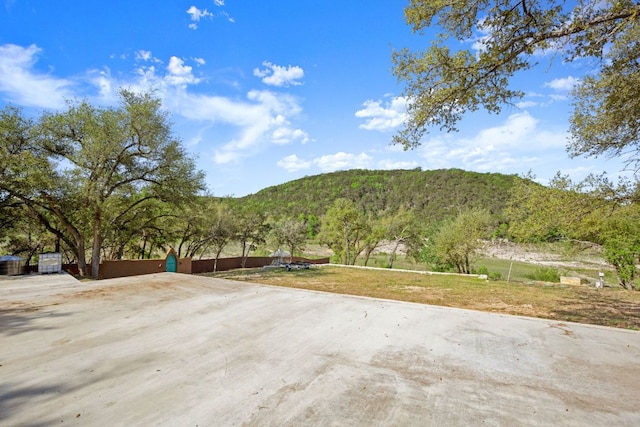 13451 Bullick Hollow Rd, Austin, TX 78726 - view of patio featuring a mountain view and a view of trees