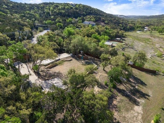 13451 Bullick Hollow Rd, Austin, TX 78726 - aerial overview of property's location with a heavily wooded area