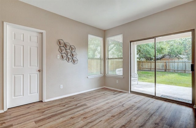 227 Woodlake Dr, Georgetown, TX 78633 - empty room with light wood finished floors