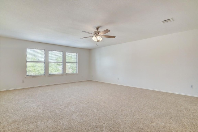 227 Woodlake Dr, Georgetown, TX 78633 - empty room with ceiling fan and light carpet