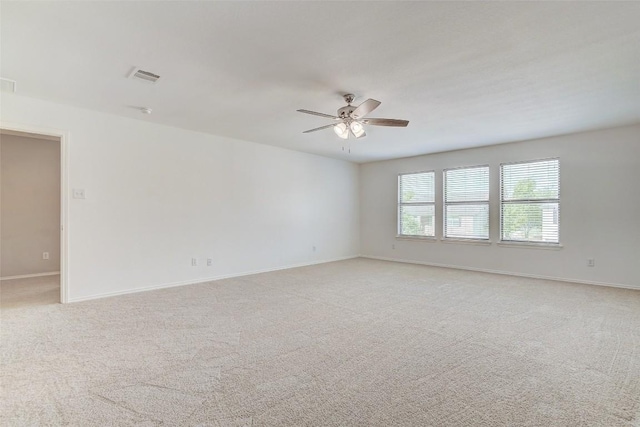 227 Woodlake Dr, Georgetown, TX 78633 - unfurnished room with a ceiling fan and light carpet