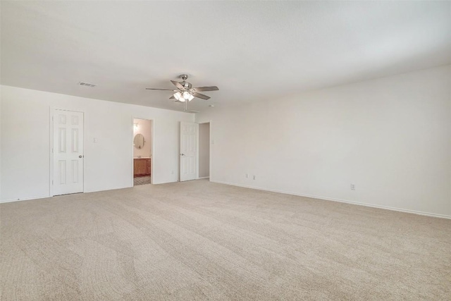 227 Woodlake Dr, Georgetown, TX 78633 - empty room with ceiling fan and light colored carpet