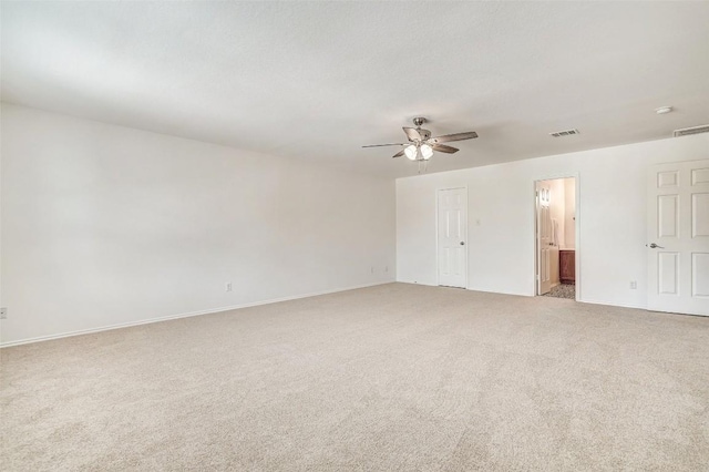 227 Woodlake Dr, Georgetown, TX 78633 - spare room featuring ceiling fan and light carpet