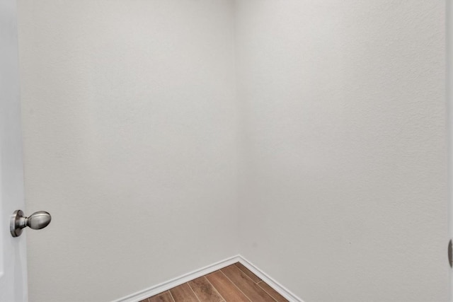282 Crimson Ln, Kyle, TX 78640 - empty room with dark wood finished floors and baseboards