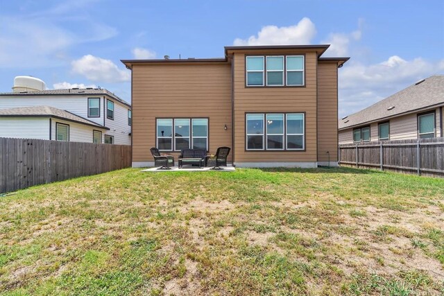 282 Crimson Ln, Kyle, TX 78640 - back of property featuring a patio area