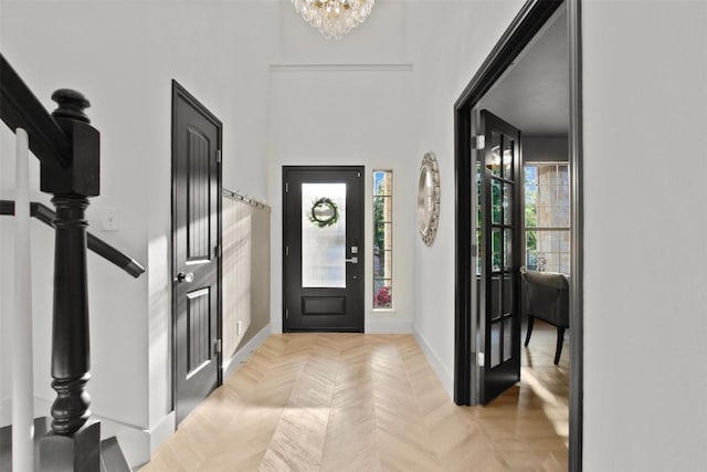 286 Stone View Trl, Austin, TX 78737 - foyer featuring a chandelier and baseboards