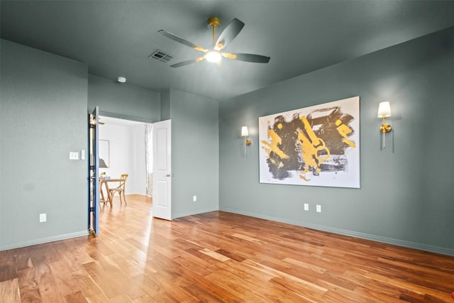 286 Stone View Trl, Austin, TX 78737 - empty room with ceiling fan, wood finished floors, and baseboards