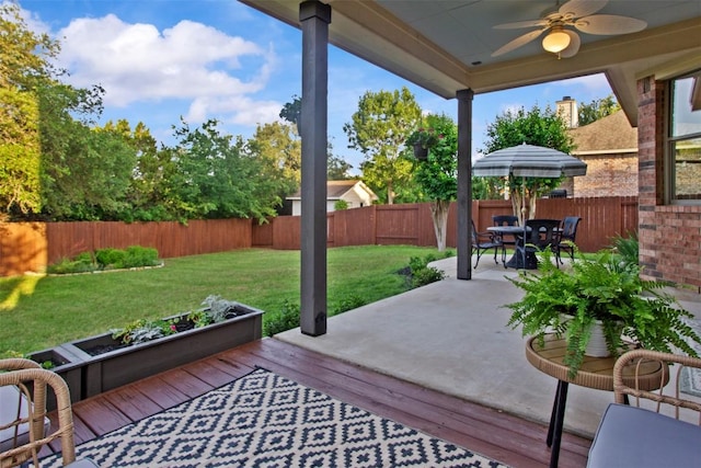 286 Stone View Trl, Austin, TX 78737 - wooden deck with a ceiling fan, a patio area, and outdoor dining space