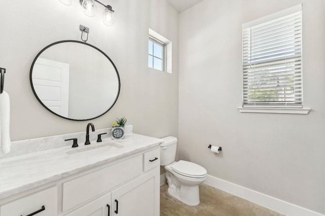 795 Van Bibber Rd, Salado, TX 76571 - bathroom featuring toilet, vanity, and baseboards