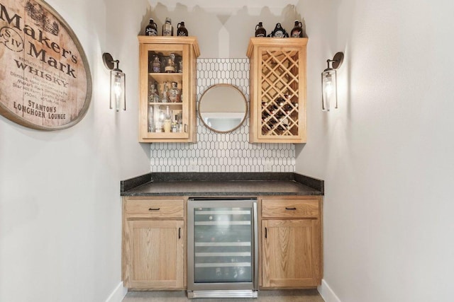 795 Van Bibber Rd, Salado, TX 76571 - indoor dry bar with beverage cooler and baseboards