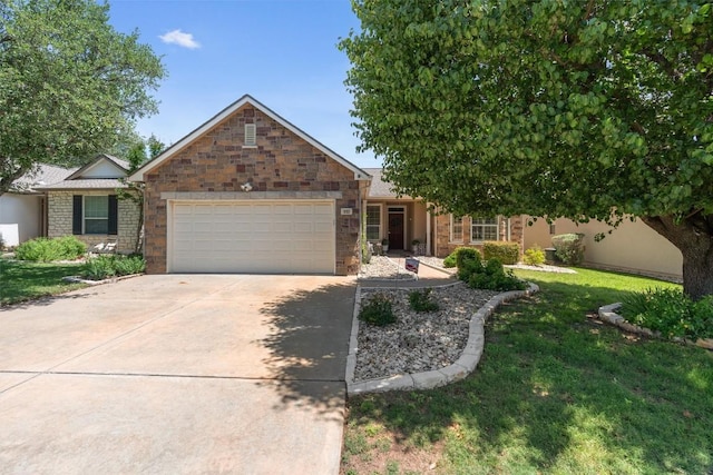 403 Dove Hollow Trl, Georgetown, TX 78633 - single story home with a garage, driveway, stone siding, and a front lawn