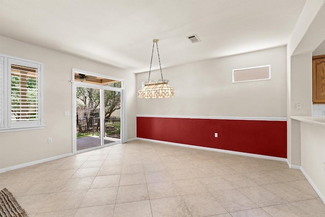 403 Dove Hollow Trl, Georgetown, TX 78633 - unfurnished dining area with light tile patterned floors