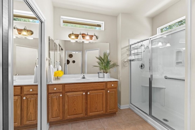 403 Dove Hollow Trl, Georgetown, TX 78633 - full bathroom featuring vanity, a stall shower, and tile patterned floors