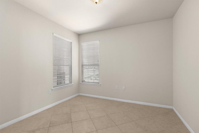 403 Dove Hollow Trl, Georgetown, TX 78633 - empty room featuring baseboards and light tile patterned floors