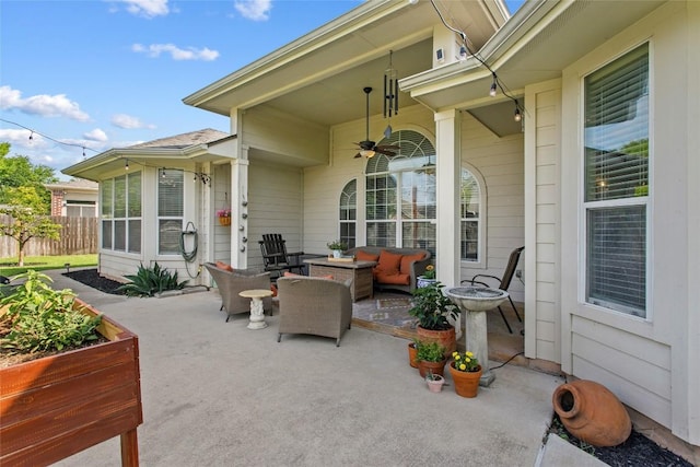 view of patio with a ceiling fan, outdoor lounge area, and fence