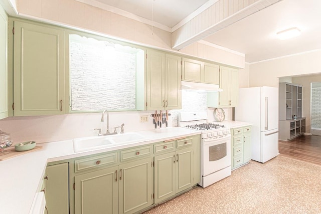 1408 W Clark St, Bartlett, TX 76511 - kitchen with white appliances, a sink, under cabinet range hood, crown molding, and green cabinets
