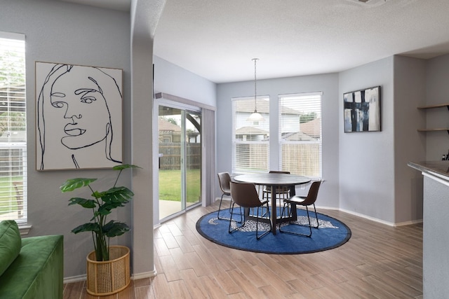 8716 Panadero Dr, Austin, TX 78747 - dining space featuring light wood-type flooring and baseboards