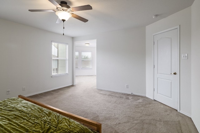8716 Panadero Dr, Austin, TX 78747 - unfurnished bedroom with carpet floors and a ceiling fan