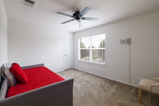 8716 Panadero Dr, Austin, TX 78747 - bedroom with light colored carpet and a ceiling fan