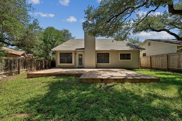 rear view of property with a patio area