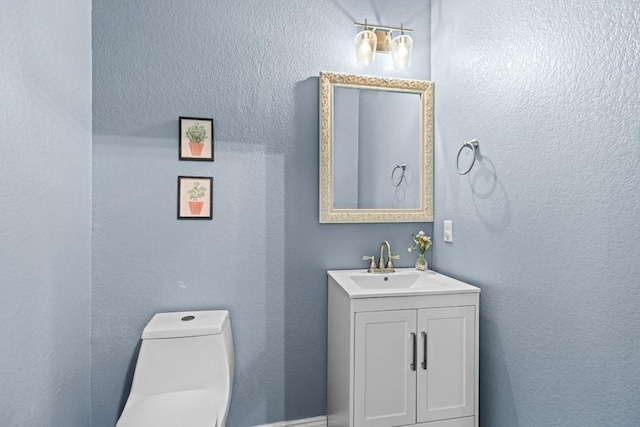 109 Reagor Dr, Taylor, TX 76574 - half bath with vanity and a textured wall