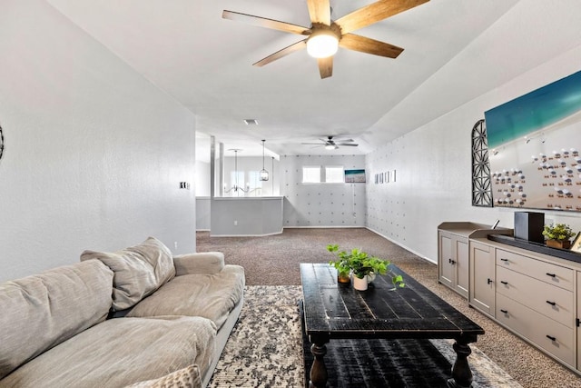 109 Reagor Dr, Taylor, TX 76574 - carpeted living room with a ceiling fan and baseboards