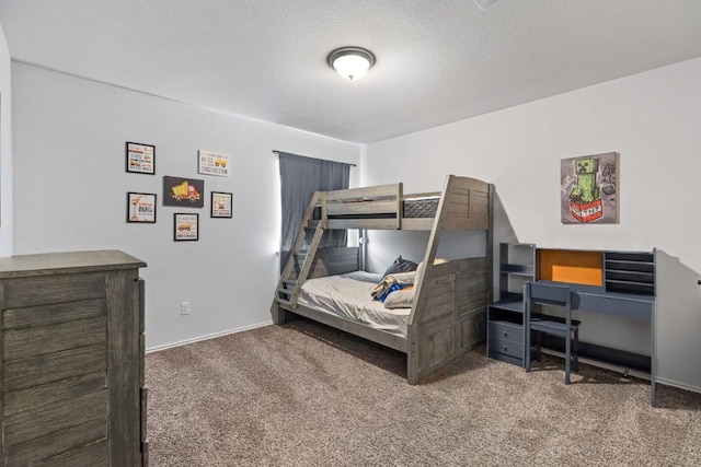 109 Reagor Dr, Taylor, TX 76574 - bedroom featuring carpet floors and a textured ceiling