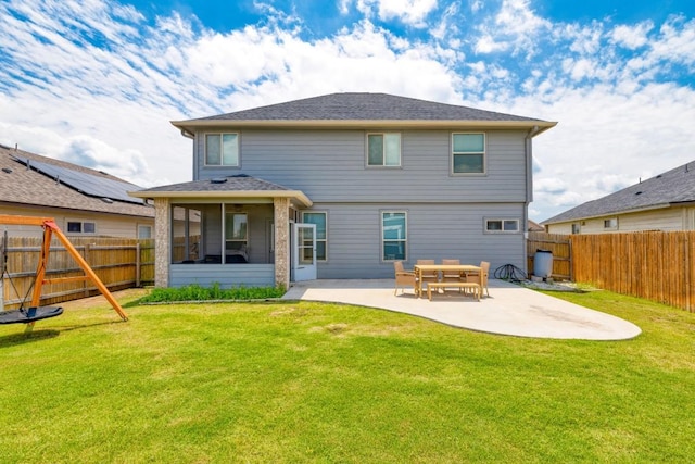 109 Reagor Dr, Taylor, TX 76574 - back of property with a patio, a fenced backyard, a sunroom, and roof with shingles