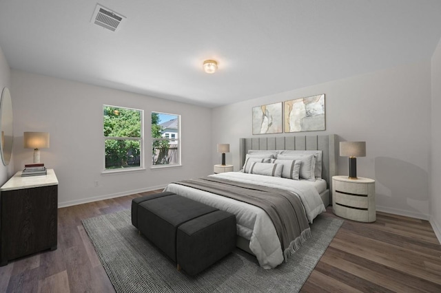 1532 Lorson Loop, Round Rock, TX 78665 - bedroom with dark wood finished floors and baseboards